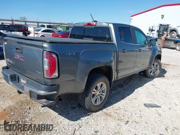 2019 GMC Canyon 4WD SLE with VIN 1GTG6CEN2K1102111, listed as a IAAI auction lot 41938971 with 156,260 mi miles and . Bid and sale history available at carsss.com. Image 4.