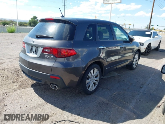 2010 Acura RDX with VIN 5J8TB2H22AA002533, listed as a IAAI auction lot 42552082 with 126,804 mi miles and . Bid and sale history available at DreamBid. Image 4.