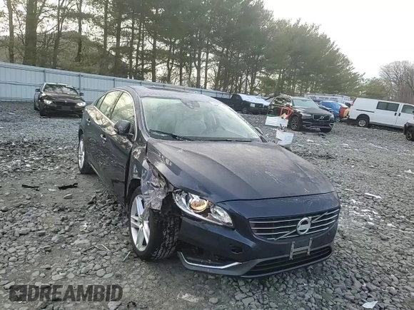 2015 Volvo S60 T5 Drive-E Premier z VIN YV126MFB2F2304526, wystawiony jako Copart lot #86641134 z przebiegiem 79 551 mil mil oraz Szkoda całkowita • Salvage title. Historia ofert i sprzedaży dostępna na DreamBid. Obrazek 10.