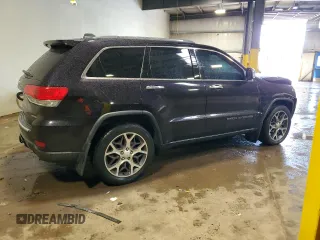 2019 Jeep Grand Cherokee Limited with VIN 1C4RJEBG2KC689827, listed as a Copart auction lot 56872615 with 96,376 mi miles and Salvage title. Bid and sale history available at DreamBid. Image 3.