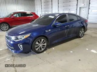 2018 Kia Optima LX z VIN 5XXGT4L33JG250352, wystawiony jako Copart lot #56005915 z przebiegiem 68 430 mil mil oraz Czysty tytuł • Clean title. Historia ofert i sprzedaży dostępna na DreamBid. Obrazek 1.
