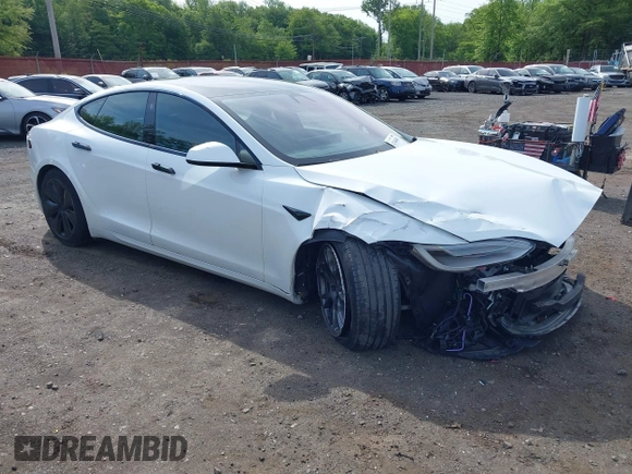 2022 Tesla Model S with VIN 5YJSA1E58NF467644, listed as a IAAI auction lot 42344403 with 52,628 mi miles and . Bid and sale history available at DreamBid. Image 19.