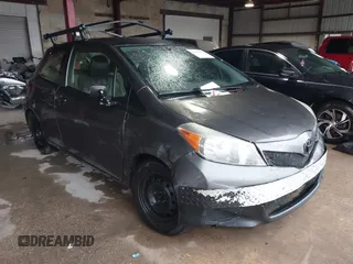2014 Toyota Yaris L with VIN JTDJTUD33ED591464, listed as a IAAI auction lot 41202670 with 157,919 mi miles. Bid and sale history available at carsss.com. Image 1.
