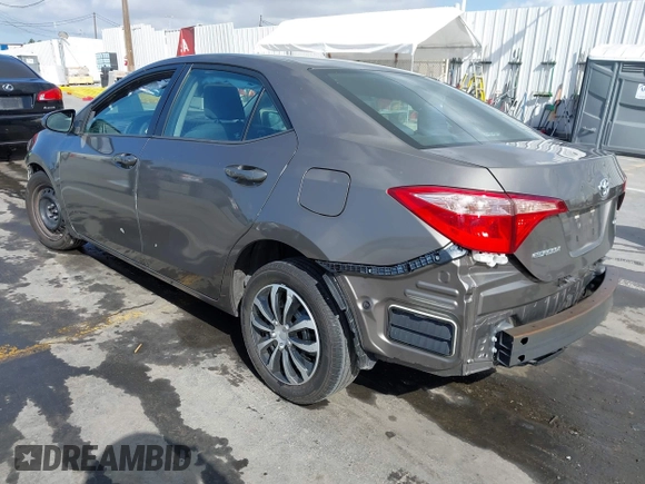2019 Toyota Corolla L with VIN 5YFBURHE8KP892394, listed as a IAAI auction lot 41917095 with 89,073 mi miles. Bid and sale history available at carsss.com. Image 3.