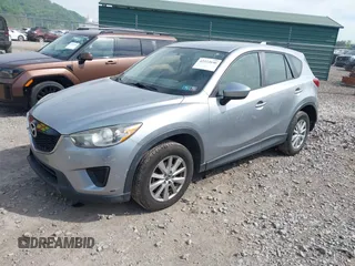 2014 Mazda CX-5 Sport with VIN JM3KE2BE9E0423737, listed as a IAAI auction lot 42222646 with 116,160 mi miles and . Bid and sale history available at DreamBid. Image 17.