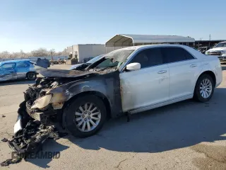 2013 Chrysler 300 z VIN 2C3CCAAGXDH615313, wystawiony jako Copart lot #46552125 z przebiegiem Nie podano mil oraz Szkoda całkowita • Salvage title. Historia ofert i sprzedaży dostępna na DreamBid. Obrazek 1.