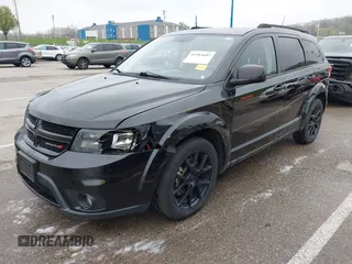 2013 Dodge Journey SXT with VIN 3C4PDDBG4DT660474, listed as a IAAI auction lot 41984607 with 124,926 mi miles and . Bid and sale history available at DreamBid. Image 2.