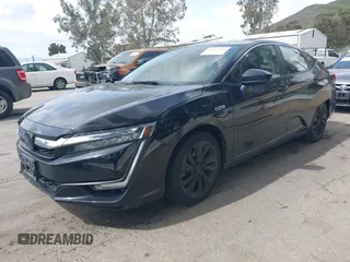 2018 Honda Clarity Plug-In Hybrid with VIN JHMZC5F10JC014054, listed as a IAAI auction lot 41932195 with 100,643 mi miles. Bid and sale history available at carsss.com. Image 17.