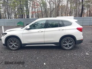 2018 BMW X1 xDrive28i with VIN WBXHT3C36J5L32162, listed as a IAAI auction lot 41802315 with 80,422 mi miles. Bid and sale history available at carsss.com. Image 14.