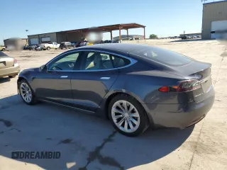 2017 Tesla Model S 60 with VIN 5YJSA1E14HF184188, listed as a Copart auction lot 55836495 with 94,623 mi miles and Salvage title. Bid and sale history available at DreamBid. Image 2.