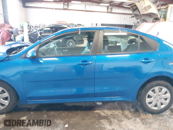 2021 Kia Rio S with VIN 3KPA24AD7ME364789, listed as a IAAI auction lot 42044676 with 54,072 mi miles and . Bid and sale history available at DreamBid. Image 14.