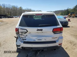 2018 Jeep Grand Cherokee Trailhawk with VIN 1C4RJFLG9JC274619, listed as a Copart auction lot 50354745 with 104,581 mi miles and Salvage title. Bid and sale history available at DreamBid. Image 6.