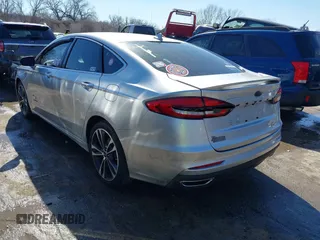 2019 Ford Fusion Titanium with VIN 3FA6P0D91KR187109, listed as a IAAI auction lot 41646320 with 107,125 mi miles. Bid and sale history available at carsss.com. Image 3.