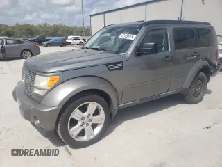 2011 Dodge Nitro Heat with VIN 1D4PT4GK4BW605310, listed as a Copart auction lot 47139015 with 123,073 mi miles and Salvage Title. Bid and sale history available at DreamBid. Image 1.