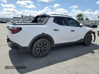 2023 Hyundai Santa Cruz SEL z VIN 5NTJC4AE3PH046045, wystawiony jako Copart lot #51332055 z przebiegiem 50 113 mil mil oraz Szkoda całkowita • Salvage title. Historia ofert i sprzedaży dostępna na DreamBid. Obrazek 3.