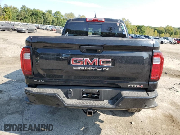 2024 GMC Canyon 4WD AT4 with VIN 1GTP6DEK2R1180037, listed as a Copart auction lot 71637264 with 7,565 mi miles and Salvage Title. Bid and sale history available at carsss.com. Image 6.