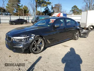 2020 BMW 5 Series M550i xDrive z VIN WBAJS7C0XLCE44248, wystawiony jako Copart lot #48660045 z przebiegiem 73 949 mil mil oraz Szkoda całkowita • Salvage title. Historia ofert i sprzedaży dostępna na DreamBid. Obrazek 1.