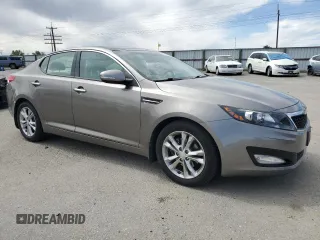 2013 Kia Optima EX with VIN 5XXGN4A79DG222138, listed as a Copart auction lot 56686335 with 85,801 mi miles and Salvage title. Bid and sale history available at DreamBid. Image 4.