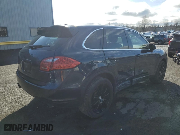 2012 Porsche Cayenne with VIN WP1AA2A20CLA02006, listed as a Copart auction lot 49129885 with 143,605 mi miles and Salvage title. Bid and sale history available at DreamBid. Image 3.
