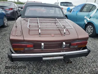 1979 FIAT 124 Spider z VIN 124CS20146682, wystawiony jako Copart lot #73923954 z przebiegiem 83 258 mil mil oraz Szkoda całkowita • Salvage title. Historia ofert i sprzedaży dostępna na DreamBid. Obrazek 6.