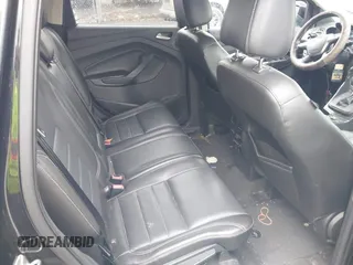 2014 Ford Escape Titanium with VIN 1FMCU9J99EUD38866, listed as a IAAI auction lot 42052579 with 202,337 mi miles. Bid and sale history available at carsss.com. Image 8.