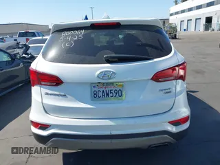 2017 Hyundai Santa Fe 2.4L z VIN 5XYZTDLB0HG403842, wystawiony jako IAAI lot #42206543 z przebiegiem 77 900 mil mil oraz . Historia ofert i sprzedaży dostępna na DreamBid. Obrazek 17.