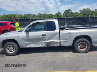 1999 Dodge Dakota SLT z VIN 1B7GL22X9XS258964, wystawiony jako IAAI lot #42309862 z przebiegiem 177 561 mil mil oraz . Historia ofert i sprzedaży dostępna na DreamBid. Obrazek 14.