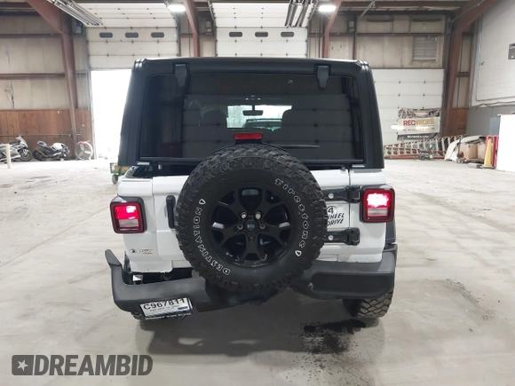 2023 Jeep Wrangler Sport S with VIN 1C4HJXDN2PW632584, listed as a IAAI auction lot 41965191 with 20,288 mi miles and . Bid and sale history available at DreamBid. Image 17.
