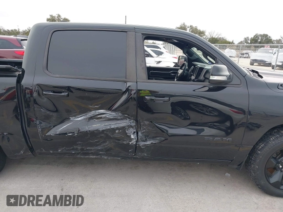 2019 Ram 1500 Big Horn z VIN 1C6RREFT1KN891182, wystawiony jako IAAI lot #41634042 z przebiegiem 128 972 mil mil oraz . Historia ofert i sprzedaży dostępna na DreamBid. Obrazek 13.