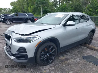 2022 BMW X2 sDrive28i z VIN WBXYH9C09N5T71828, wystawiony jako IAAI lot #40536245 z przebiegiem 36 012 mil mil oraz . Historia ofert i sprzedaży dostępna na DreamBid. Obrazek 18.