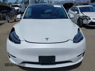 2020 Tesla Model Y Long Range with VIN 5YJYGDEE2LF058515, listed as a IAAI auction lot 41932748 with 62,885 mi miles and . Bid and sale history available at DreamBid. Image 12.