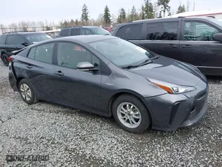 2021 Toyota Prius L Eco with VIN JTDKAMFU2M3143138, listed as a IAAI auction lot 41658263 with 102,718 mi miles. Bid and sale history available at carsss.com. Image 13.
