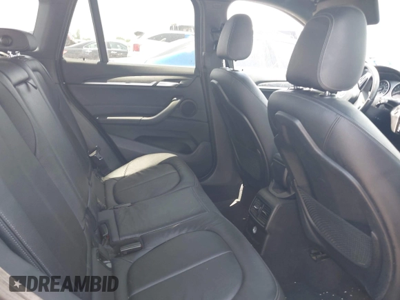 2017 BMW X1 xDrive28i with VIN WBXHT3Z30H4A65417, listed as a IAAI auction lot 42328797 with 103,788 mi miles and . Bid and sale history available at DreamBid. Image 8.