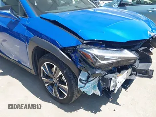 2022 Lexus UX with VIN JTHX3JBH0N2049742, listed as a IAAI auction lot 41917341 with 18,728 mi miles. Bid and sale history available at carsss.com. Image 17.