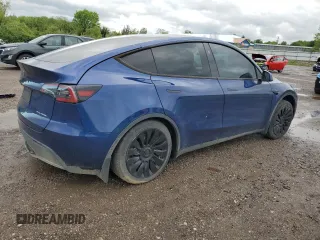 2024 Tesla Model Y Long Range z VIN 7SAYGDEE0RA286070, wystawiony jako Copart lot #58200425 z przebiegiem 16 881 mil mil oraz Szkoda całkowita • Salvage title. Historia ofert i sprzedaży dostępna na DreamBid. Obrazek 3.