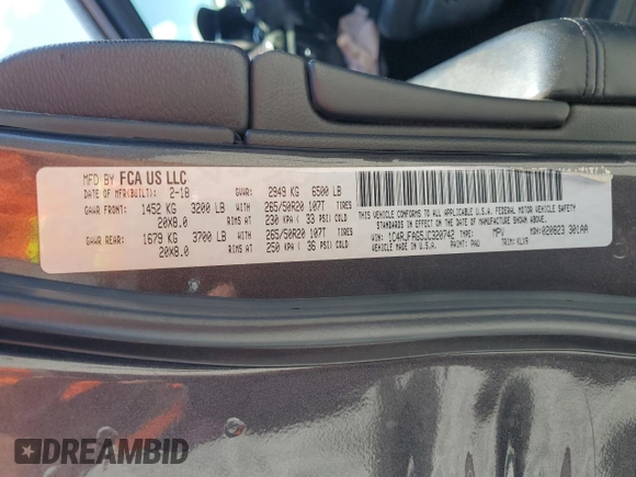2018 Jeep Grand Cherokee Altitude with VIN 1C4RJFAG5JC320742, listed as a Copart auction lot 56988195 with 140,320 mi miles and Salvage title. Bid and sale history available at DreamBid. Image 13.