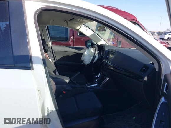 2015 Mazda CX-5 Sport with VIN JM3KE2BE3F0449722, listed as a IAAI auction lot 41825810 with 181,949 mi miles and . Bid and sale history available at DreamBid. Image 5.