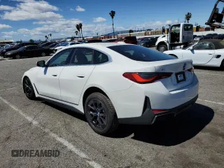 2023 BMW i4 eDrive40 z VIN WBY73AW05PFN75140, wystawiony jako Copart lot #51791515 z przebiegiem 28 426 mil mil oraz Szkody całkowita. Historia ofert i sprzedaży dostępna na DreamBid. Obrazek 2.