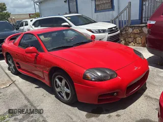 1999 Mitsubishi 3000GT GT z VIN JA3AM84J3XY001387, wystawiony jako Copart lot #61198735 z przebiegiem 137 514 mil mil oraz Czysty tytuł • Clean title. Historia ofert i sprzedaży dostępna na DreamBid. Obrazek 1.