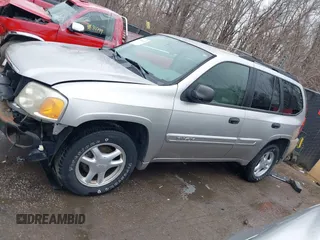 2005 GMC Envoy SLE with VIN 1GKDT13S552332088, listed as a IAAI auction lot 41699178 with 196,869 mi miles. Bid and sale history available at carsss.com. Image 15.