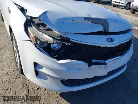 2016 Kia Optima LX with VIN 5XXGT4L36GG005859, listed as a IAAI auction lot 41053277 with 127,783 mi miles. Bid and sale history available at carsss.com. Image 18.