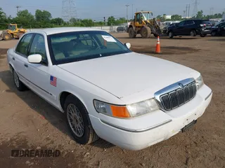 2002 Mercury Grand Marquis GS z VIN 2MEFM74W12X630926, wystawiony jako IAAI lot #42480472 z przebiegiem 58 884 mil mil oraz . Historia ofert i sprzedaży dostępna na DreamBid. Obrazek 1.