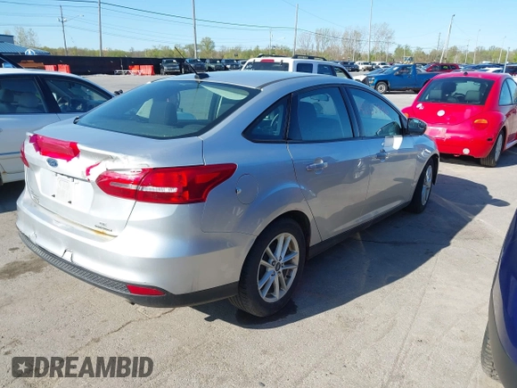 2016 Ford Focus SE with VIN 1FADP3F28GL389377, listed as a IAAI auction lot 42135996 with 172,278 mi miles. Bid and sale history available at carsss.com. Image 4.