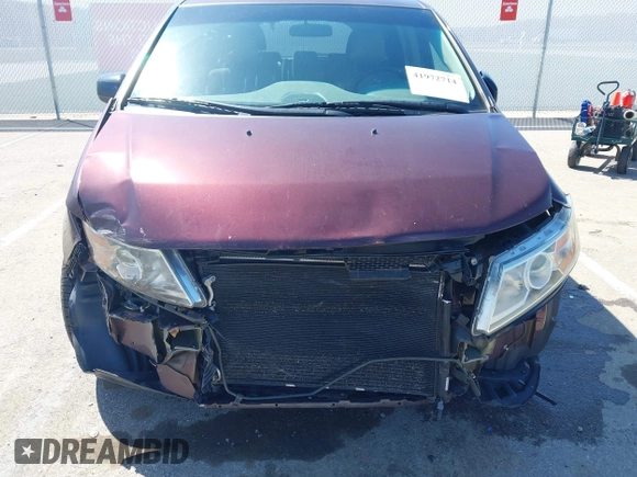 2012 Honda Odyssey EX with VIN 5FNRL5H42CB136915, listed as a IAAI auction lot 41972714 with 211,729 mi miles and . Bid and sale history available at carsss.com. Image 6.