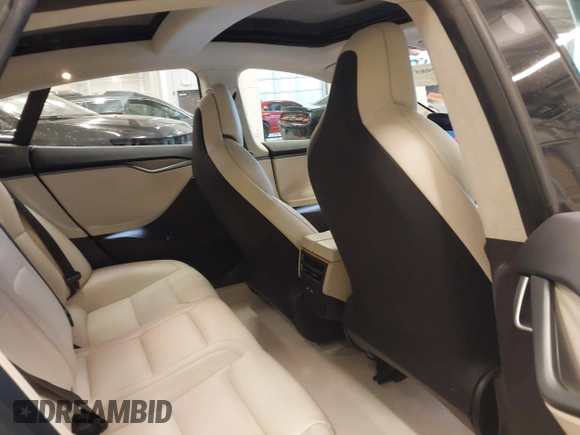 2018 Tesla Model S 75D with VIN 5YJSA1E24JF276044, listed as a IAAI auction lot 41798530 with 53,462 mi miles and . Bid and sale history available at DreamBid. Image 8.