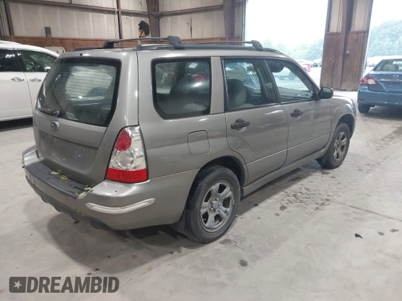 2006 Subaru Forester X with VIN JF1SG63656H700426, listed as a IAAI auction lot 42467619 with 210,918 mi miles and . Bid and sale history available at DreamBid. Image 4.
