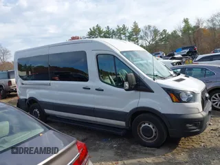 2023 Ford Transit Cargo with VIN 1FTBR1C86PKA52494, listed as a IAAI auction lot 40740671 with 9,999 mi miles and . Bid and sale history available at DreamBid. Image 13.