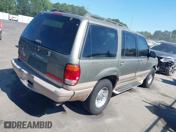 2001 Mercury Mountaineer with VIN 4M2ZU86P61UJ00123, listed as a IAAI auction lot 42692270 with 261,819 mi miles and . Bid and sale history available at DreamBid. Image 4.