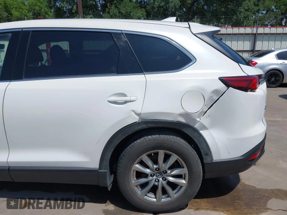 2019 Mazda CX-9 Touring z VIN JM3TCBCY2K0300702, wystawiony jako IAAI lot #42194050 z przebiegiem 98 247 mil mil oraz . Historia ofert i sprzedaży dostępna na DreamBid. Obrazek 6.