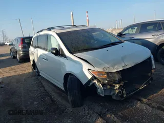 2012 Honda Odyssey Touring with VIN 5FNRL5H98CB143248, listed as a IAAI auction lot 42821171 with 289,826 mi miles and . Bid and sale history available at DreamBid. Image 1.
